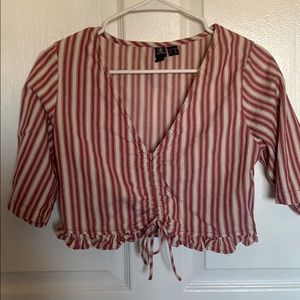 Cropped red and white top with ruffles